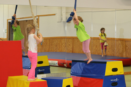 Kids Palying in Sports Room