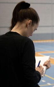 Woman taking notes 